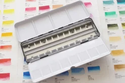 Roman Szmal Kasetka metalowa na akwarele w kostkach - - 12 szt.